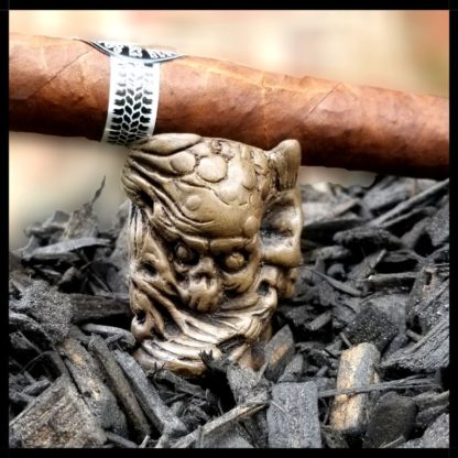 Skull Cigar Stand with cigar