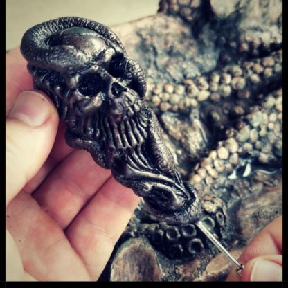 Skull designed cigar nubber