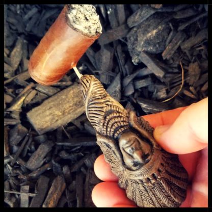 Indian Cigar Nubber With Cigar