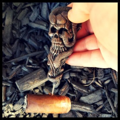Skull Cigar Nubber With Cigar